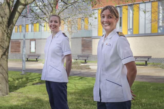 Leading Naval Nurse Sarah Belcher and Lieutenant Amy Phelps, right, representing the Queen Alexandra Royal Navy Nursing Service (QARNNS). Photo: LPhot Belinda Atker