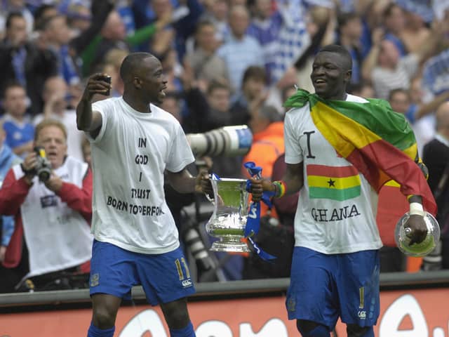 Sulley Muntari (right) parades the FA Cup with Pompey team-mate John Utaka following their May 2008 Wembley triumph. Picture: Will Caddy