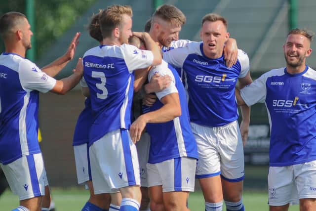 Denmead celebrate Ryan Chandler's winner against Harvest at Front Lawn. Picture by Martyn White