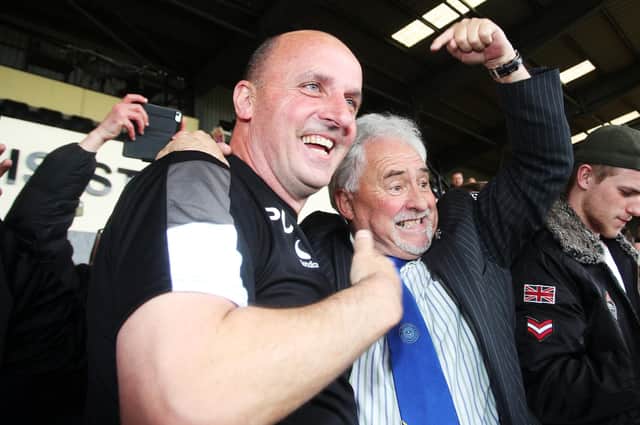 Ex-Pompey manager Paul Cook celebrates the Blues' promotion from League Two at Notts County with then chairman Iain McInnes.