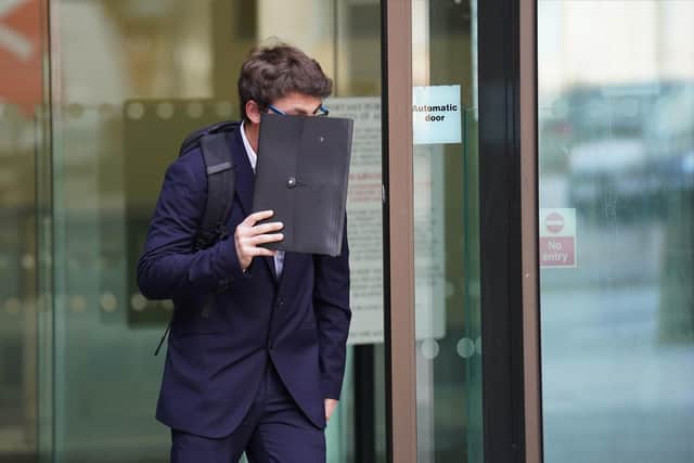 Daniel Brydges of Portsmouth covers his face as he leaves Westminster Magistrates' Court, London where he is accused of trespassing on Buckingham Palace grounds Picture: James Manning/PA Wire