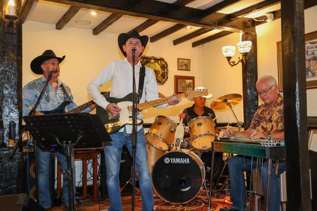 A country band playing on the opening night at Hunters Inn, Swanmore.
Photo by Alex Shute