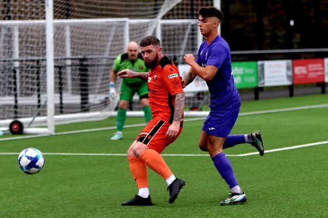 AFC Stoneham's leading scorer Duarte Martins, right, in action against AFC Portchester last weekend. Picture by Tom Phillips
