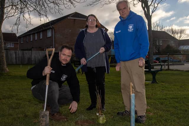 Mark Coates, resident Linda Daynes and Richard Coates. Linda discovered the newly planted saplings being vandalised and Richard and Mark have set about repairing the damage in Mengham Park, Hayling Island. Picture: Alex Shute