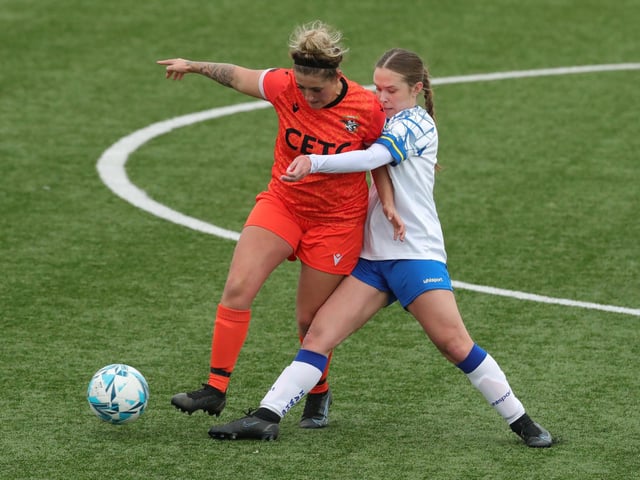 Hawks' Millie McNamara under pressure from Gosport Falcons' Savannah Cooper. Picture: Dave Haines