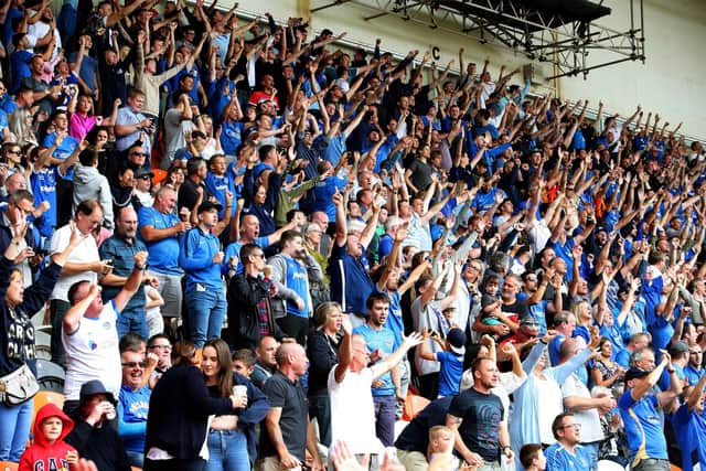 Pompey fans celebrating a Portsmouth goal