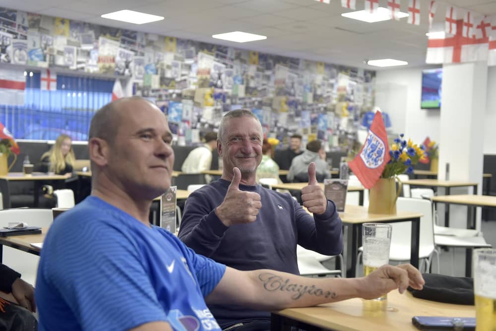 England fans come to the Legends Lounge at Portsmouth FC on Monday, November 21 to watch the England v Iran World Cup match. 

Pictured is: (right) Tony Thurston (64) from Farlington.

Picture: Sarah Standing (211122-6849)