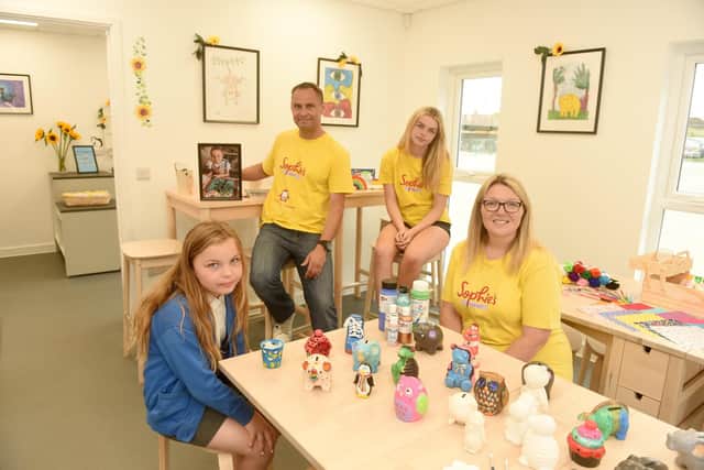 Sophie's family, from left, Sister Amelia, nine, dad Gareth, 43, sister Lucy, 15, and mum Charlotte Fairall, 42 in the new art studio.
Picture: Sarah Standing (240622-907)