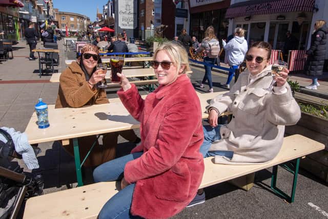 Ellis Ballard, Blair Ballard and Josie Taylor enjoy the sunshine at Palmerston Road. Picture: Habibur Rahman
