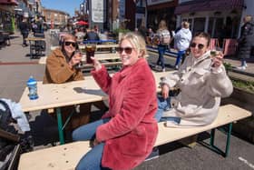 Ellis Ballard, Blair Ballard and Josie Taylor enjoy the sunshine at Palmerston Road. Picture: Habibur Rahman