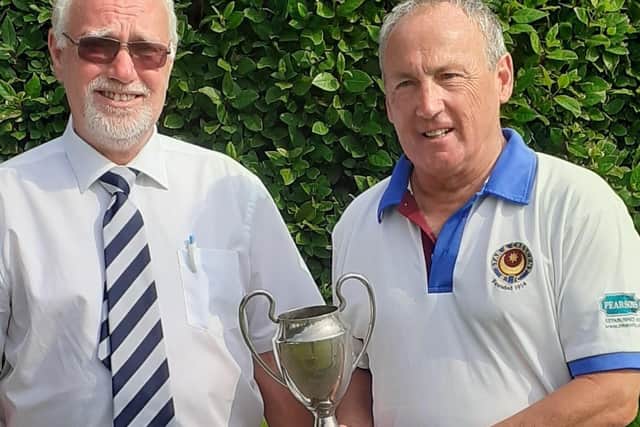 Singles winner Simon Filippi with P&D competition secretary Simon Batcheler.