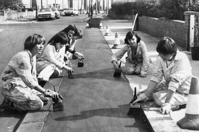 Working under the Government sponsored Community Industry scheme painting the asphalt strip in Jutland Avenue in September 1980.