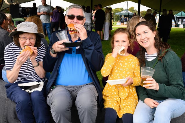 Pictured is: Another family enjoy the food at the South Downs Food Festival Picture: Keith Woodland (140921-89)