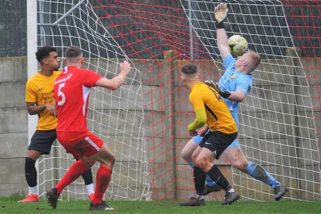 Luke Dempsey scores for Horndean in a 4-2 home Wessex League win over Bashley last month - but the New Forest club have since won seven in a row to emerge as another of Hamworthy's title contenders. Picture: Martyn White