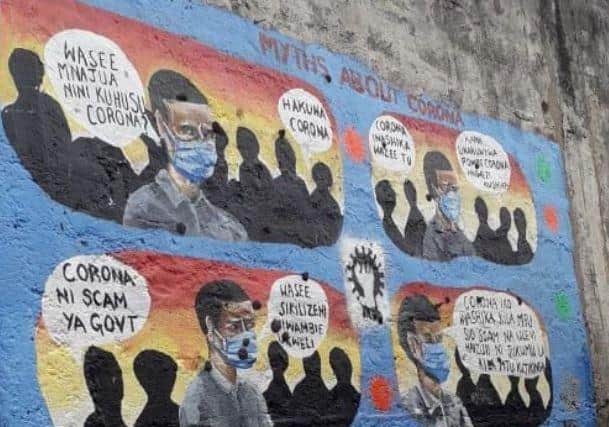 A mural comic strip illustrating the myths around Covid.