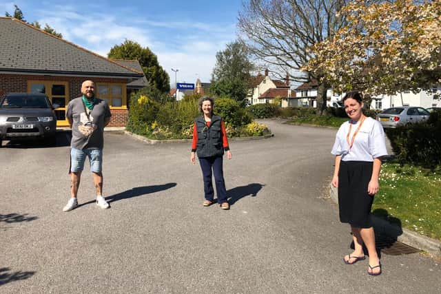 A team of volunteers behind LunchBank Po9 have been working out of Bedhampton Community Centre to provide meals to members of the community in need. Pictured: Darren Mckenna, director of 13ANK Community Interest Company, Philippa Gray from Bedhampton Community Centre and Lauren Razzell who runs LunchBank Po9