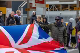 Anti-immigration protest formed near the UK Border Agency Building in Portsmouth. Picture: Mike Cooter (070824)