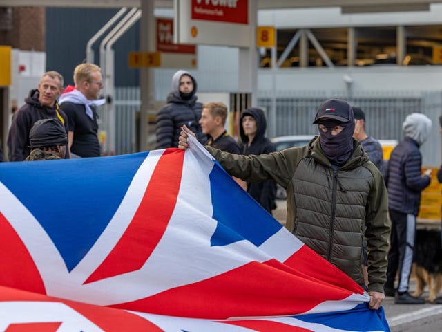 Anti-immigration protest formed near the UK Border Agency Building in Portsmouth. Picture: Mike Cooter (070824)