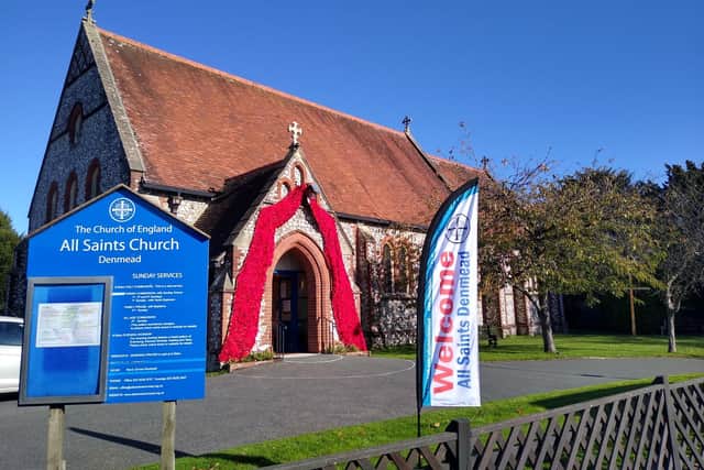 All Saints Church in Denmead with 1,547 knitted poppies around the doorway for Remembrance Sunday 2020. Picture: Rev Emma Racklyeft