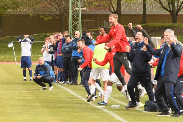 Journey's end - US Portsmouth boss Glenn Turnbull (crouching) watches on as Binfield start to celebrate their FA Vase semi-final shoot-out success. Picture: Keith Woodland