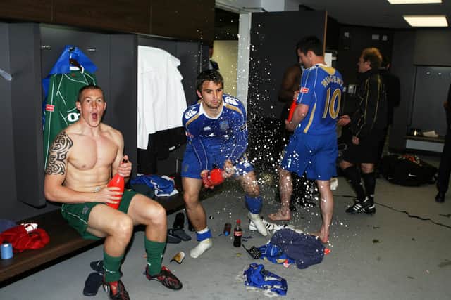 Niko Kranjcar sprays Champagne in the Wembley dressing room following Pompey's win in the 2008 FA Cup final, watched by Jamie Ashdown. Picture: Joe Pepler