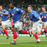 Yakubu celebrates scoring from the penalty spot with team-mates, from  left to right, Patrick Berger, Matthew Taylor and Gary O'Neil.  Picture: Mike Hewitt/Getty Images