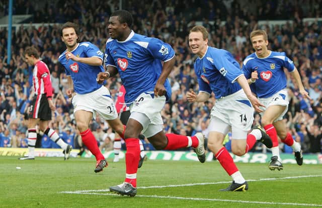 Yakubu celebrates scoring from the penalty spot with team-mates, from  left to right, Patrick Berger, Matthew Taylor and Gary O'Neil.  Picture: Mike Hewitt/Getty Images