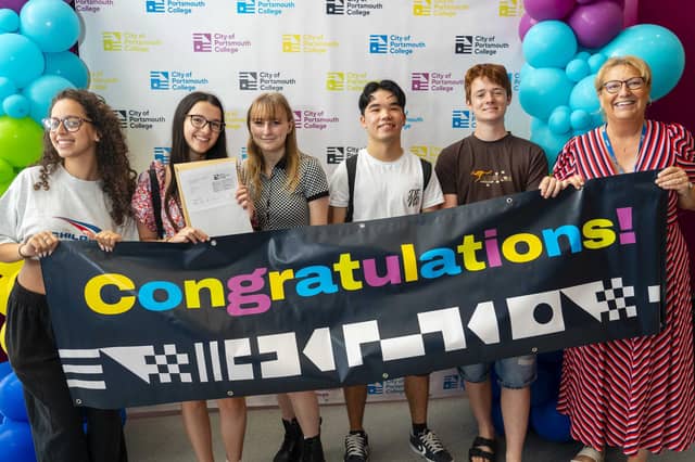 Students celebrate their results at City of Portsmouth College results day 2024.