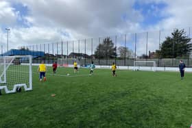 Street Soccer Academy participants enjoy playing football on the course