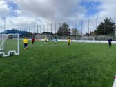 Street Soccer Academy participants enjoy playing football on the course