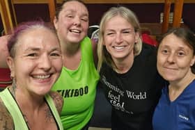 Kerry with her consultant Sam and other members at a fitness class.