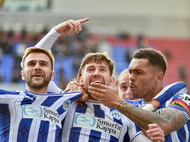 Pompey are on the trail of Wigan's Callum Lang