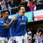 Marc McNulty celebrates scoring his first goal of the League Two play-off semi-final first leg against Plymouth in May 2016. Picture: Joe Pepler