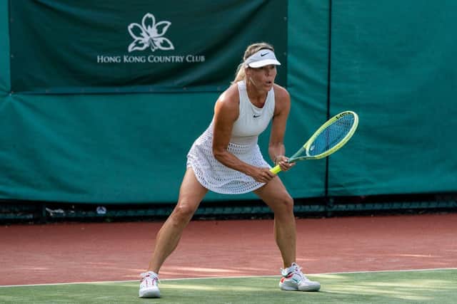 Michelle ready to return a serve