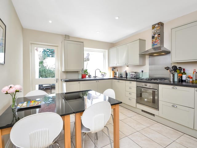 The property features a recently renovated kitchen and dining area.
