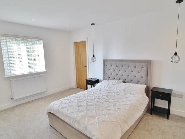 This property comes with 2 dressing rooms, a utility room and a huge open-plan kitchen.