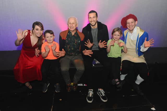 Wayne Sleep, third left, and Portsmouth FC player Christian Burgess, third right, with some of Hayling Musical Society, from left, Kate Backaller, 30, George Porter, five, Phoebe Perry , six, and Paul Goldthorpe, 30
Picture: Sarah Standing (200220-8283)
