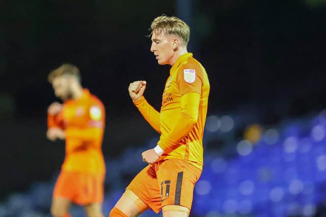 Ronan Curtis celebrates his second goal in Pompey's 3-0 win over Southend in the EFL Trophy. Picture: Nigel Keene/ProSportsImages