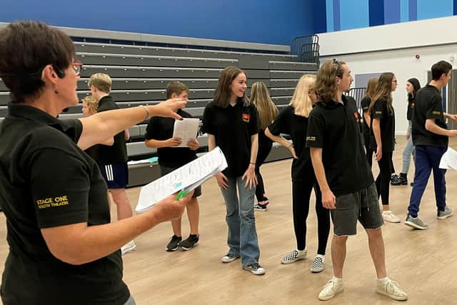Musical director Jacqui Evemy instructs Stage One musical theatre group.