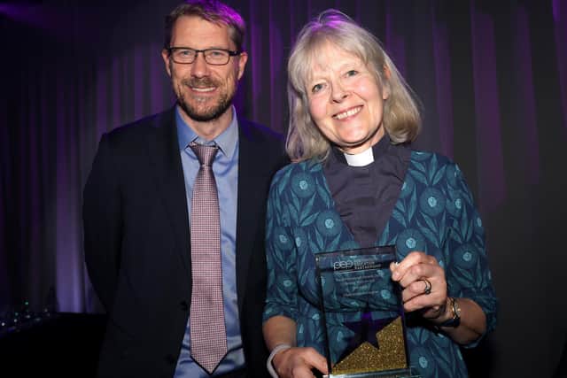 Editor of The News, Mark Waldron, presenting the Unsung Hero award to Charlotte Hetherington from Arundel Court Primary School.

Picture: Chris Moorhouse