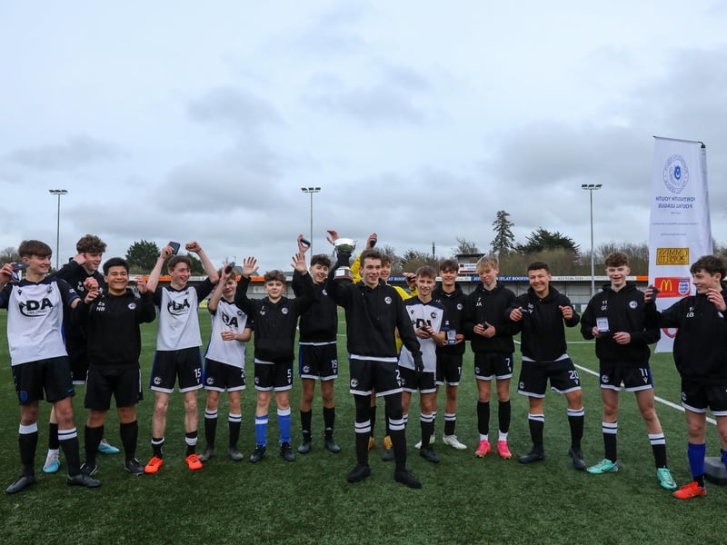 Captain Daniel Andrews (holding cup) celebrates with his Fleur de Lys Victory team. Picture: Chris Moorhouse