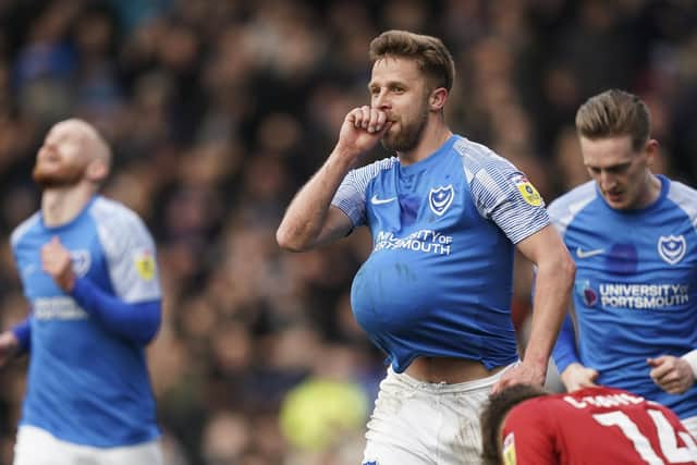 Man of the match Michael Jacobs celebrates scoring Pompey's second in their 4-0 thumping of Cheltenham. Picture: Jason Brown/ProSportsImages