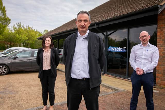 Louise Gascoigne, operations director, Nic Cronin MD and Kev Penny, technical director, in front of the new office