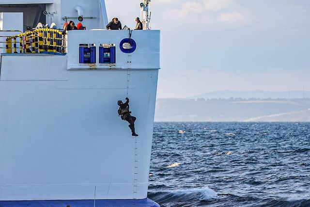 Marines practised boarding a ferry after launching from HMS Tamar. Photo: Royal Navy