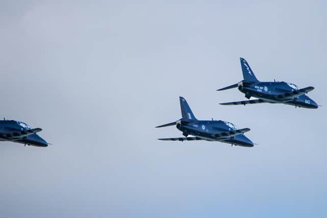 Three Royal Navy Hawk Jets completed a dramatic, high speed fly by of Portsmouth Harbour on Thursday afternoon as the planes prepare to retire. Photos by Alex Shute