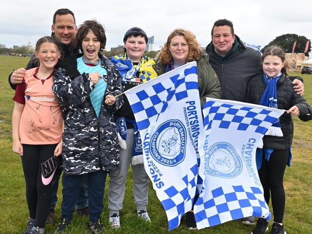 Thousands of Pompey FC fans flocked to Southsea Common to celebrate the team's League One title and promotion. Pictured: The Jones Family and the Staley Family Picture Credit: Keith Woodland
