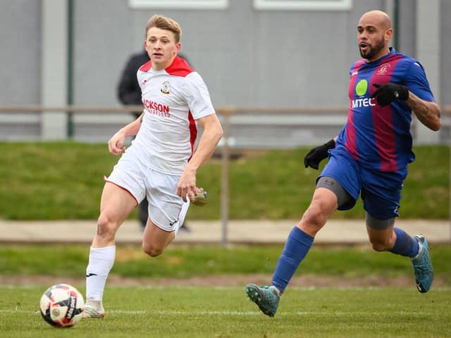 Horndean's Zack Willett, left scored a hat-trick in a 3-1 win a Stoneham in January 2022 - the Purples have not lost at home in the Wessex League since. Picture: Keith Woodland