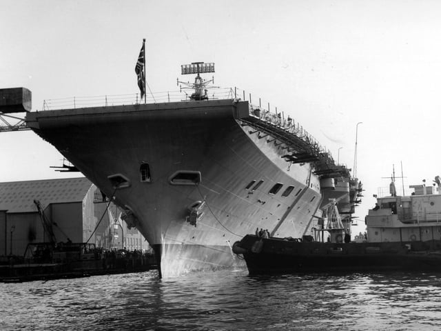 HMS Bulwark emerging after a refit from Portsmouth's dry dock in 1968. The News PP4998