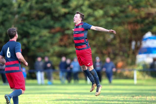 Danny Lane celebrates after completing his hat-trick for Paulsgrove against Bush Hill. Picture: Chris Moorhouse