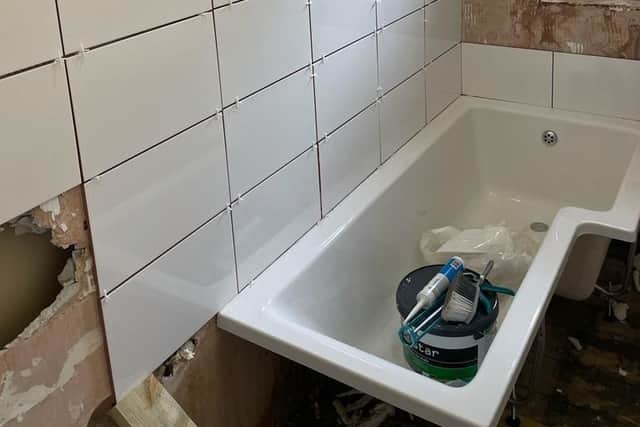 Works undertaken to a bathroom. Bradley Willis-Chambers informed the complainant that the wall was rotten and needed to come down. Instead, Willis-Chambers tiled over the wall in attempt to defraud the customer.
